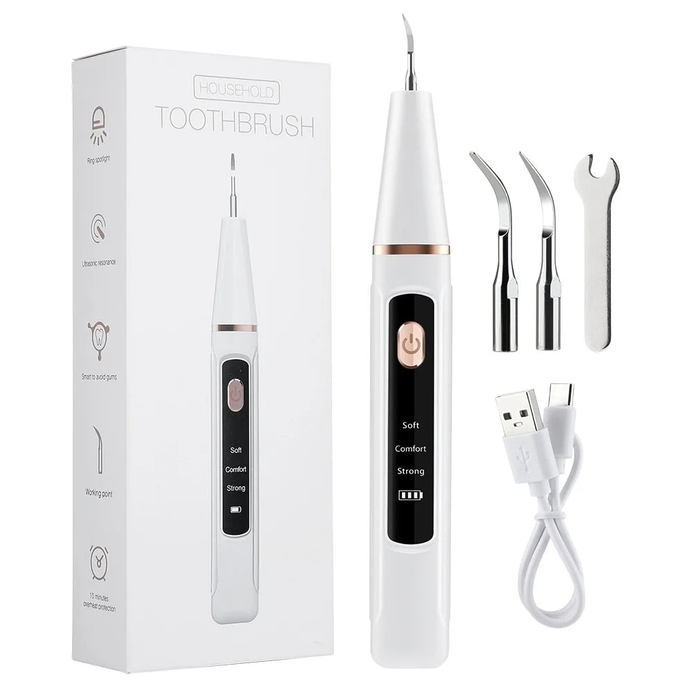 Image of a Dental Cleaning Kit with Ultrasonic Scaler Device, Multiple Cleaning Tips, and a USB Charging Cable for Oral Care Maintenance.